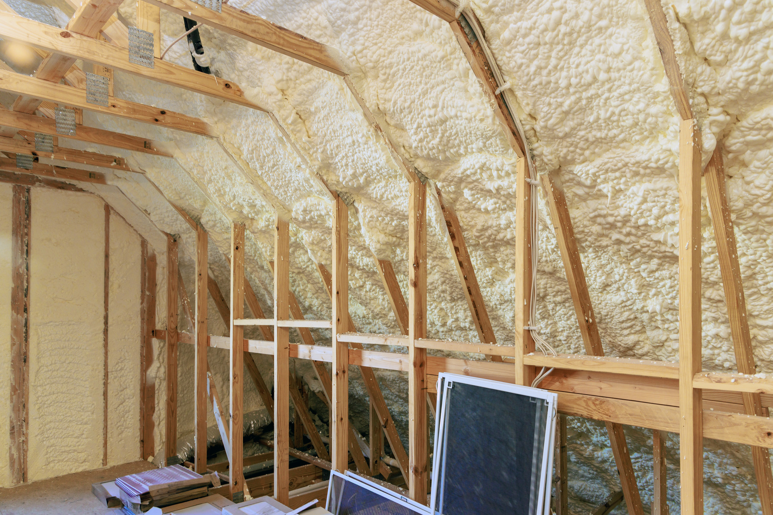 New house under construction is insulated with spray foam thermal hydro insulation
